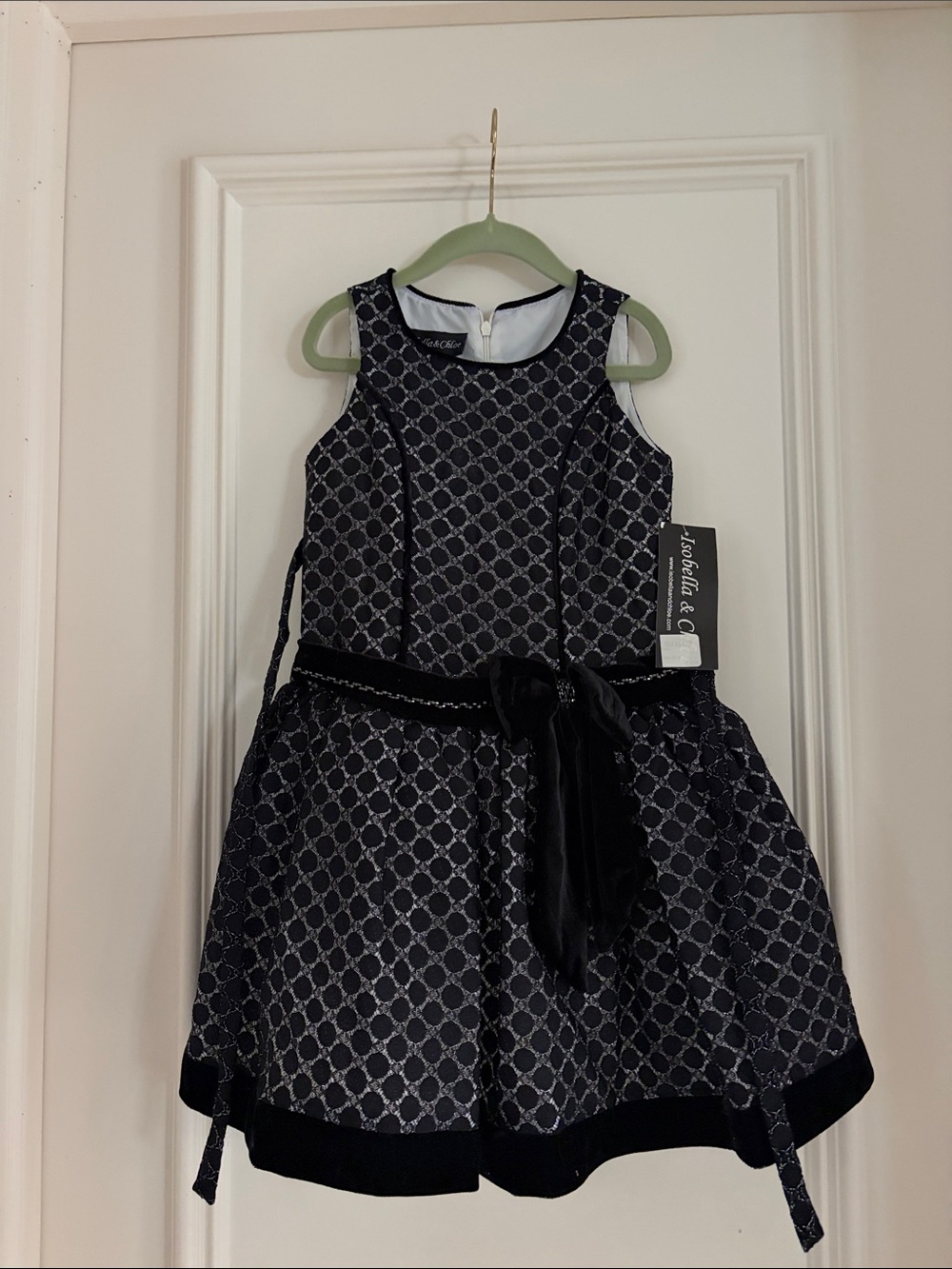 Isobella & Chloe Navy Patterned Girls Dress with Velvet Bow